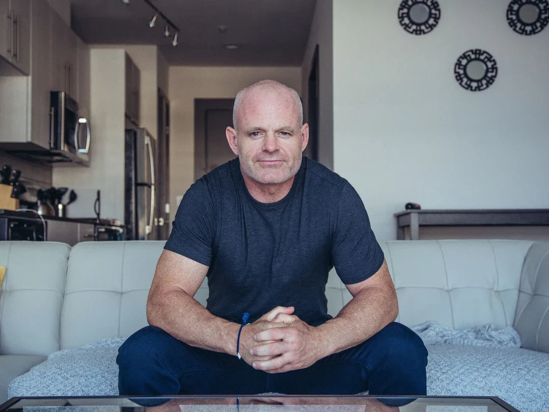 Man sitting on sofa 